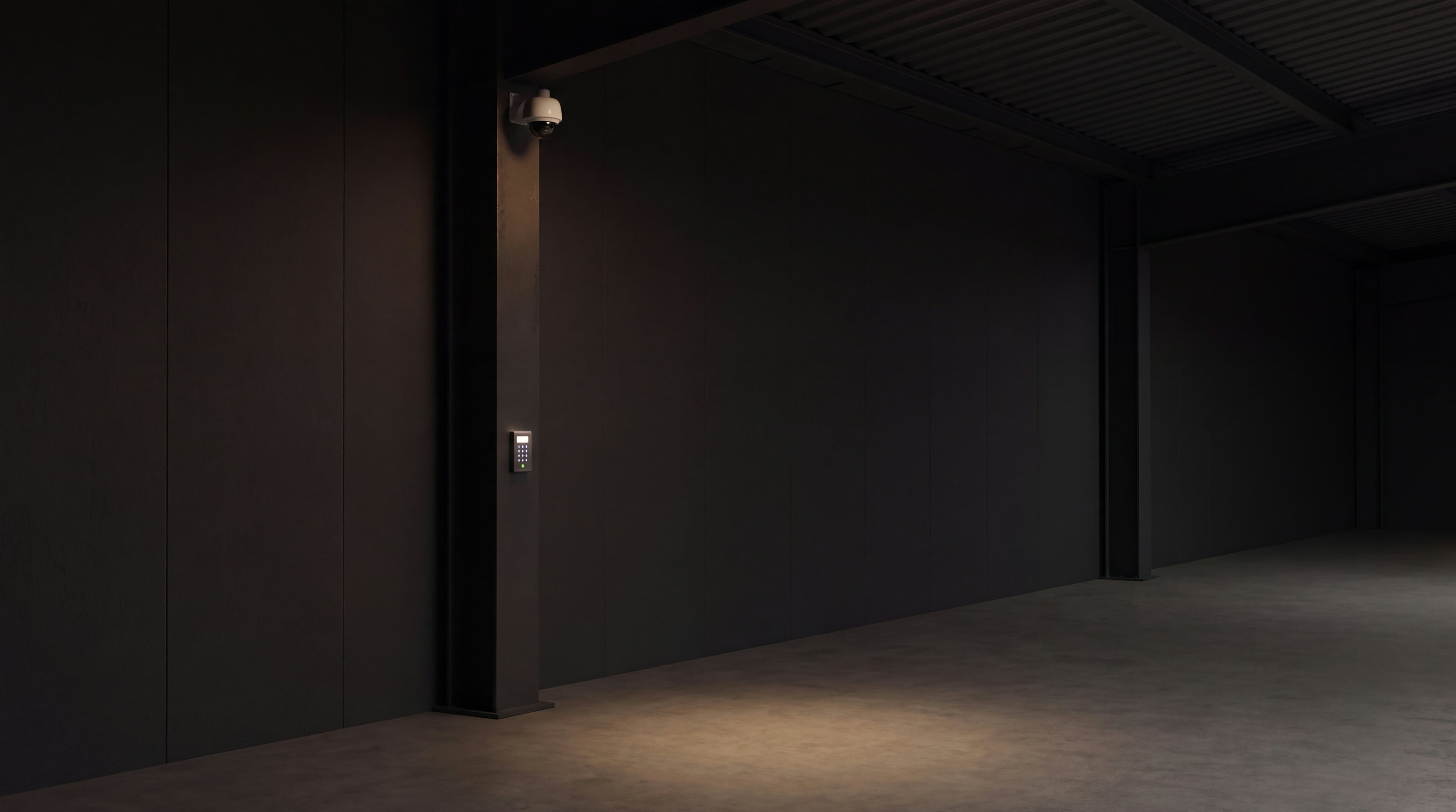 Interior security camera and glowing keypad in shadow inside the Vault 620 hall